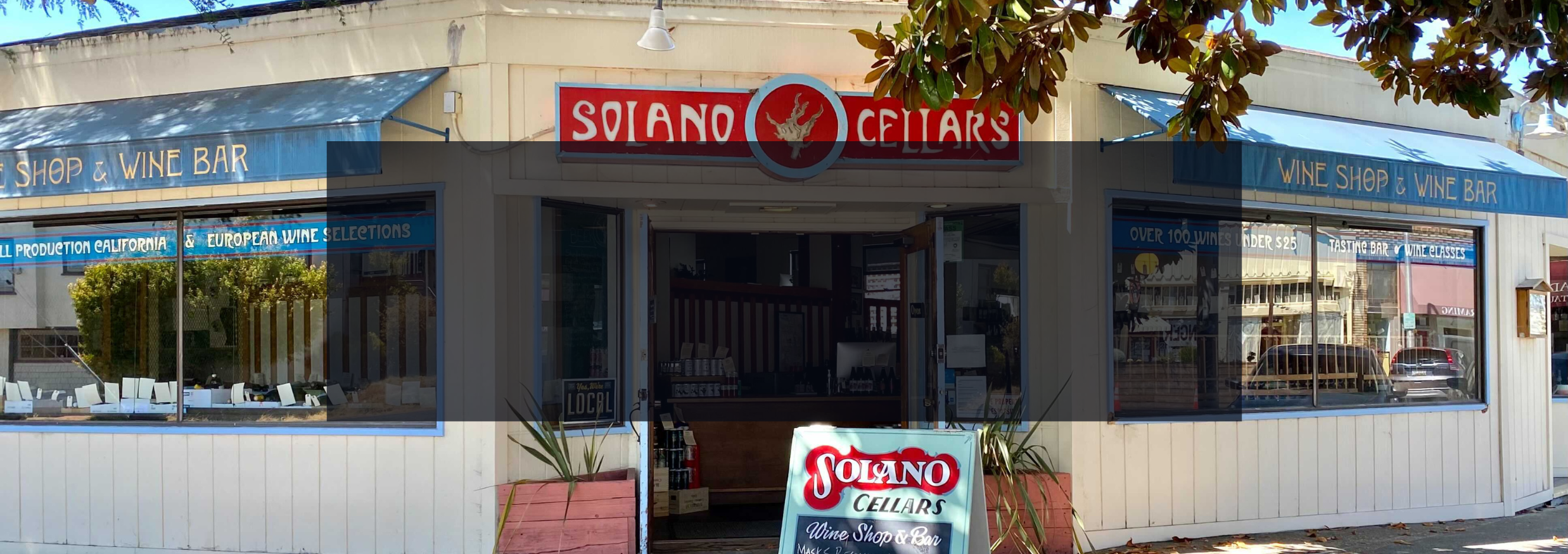 Solano Cellars facade in Berkeley, CA with a description about the business.